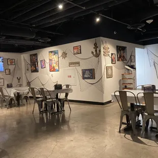 a restaurant with tables and chairs