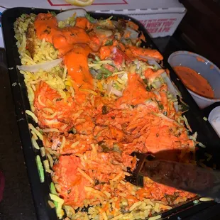 BUTTER CHICKEN BIRYANI.