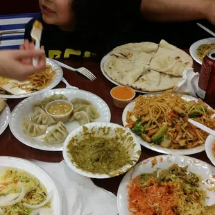 Soweee couldn't help  out selves.  Chicken biryani and shrimp biryani, momos, palak paneer, chicken noodle, naan