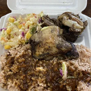 Jerk chicken, rice and peas and coleslaw.