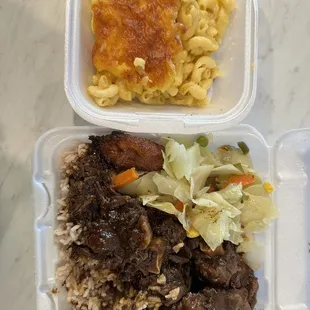 Small oxtail plate with a extra side of Macaroni and cheese.... Only One piece of plantain included if you want more it&apos;s extra!!  $28.00