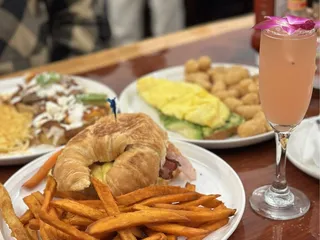 Roosters On The River