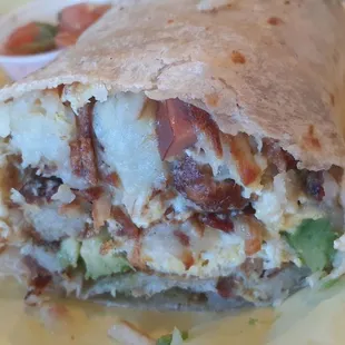 Inside of mixed breakfast burrito + avocado