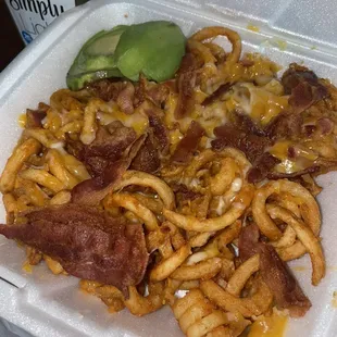 Curly Fries with cheese, bacon and avocado