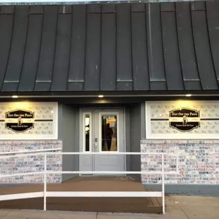 the entrance to a restaurant