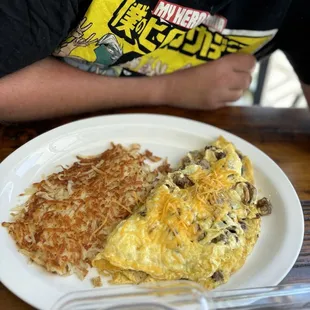 The Austin- hashbrowns, sausage omelet