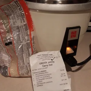 Drug out the rice cooker, so that we can eat our meals