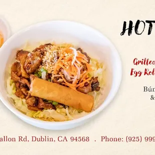 a bowl of noodles and a roll