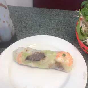 Spring roll, two shrimp and two tiny pieces of grilled pork.