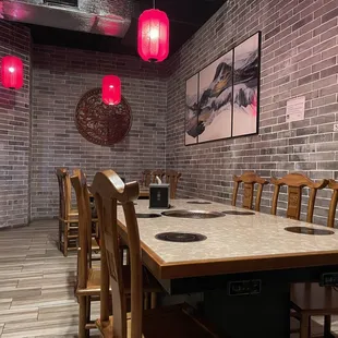 a table and chairs in a restaurant