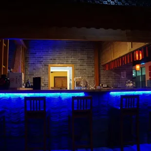a bar with blue lights
