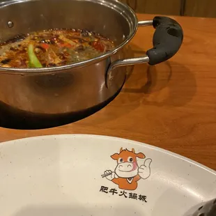 Spicy broth in personal hot pot