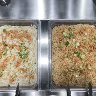 two pans of noodles and noodles