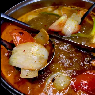 Half and half hot pot, with Thai Suki and Spicy Vietnamese Lau soup bases!