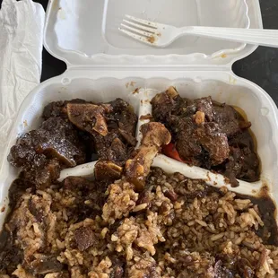 Oxtails with rice and peas
