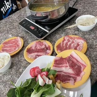 Thai sour soup &amp; Yellow Curry soup. All you can eat Meats &amp; Veggies