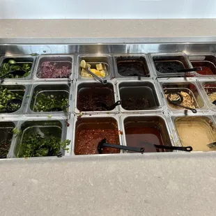 Sausage, onion and chili sauces