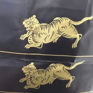 a pair of tigers on a hot pot