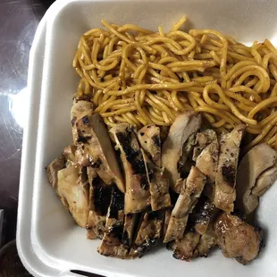 chicken and noodles in a styrofoam container