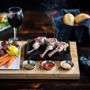 Lamb Chops searing on Lava Rock at Hot Rocks