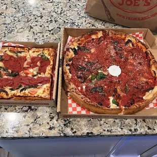 Chicken with artichoke, fresh tomatoes and spinach. Detroit Left, Chicago Right YUM