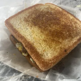 Burger  on texas toast ( butter ).  Stop the press. I think we got something here Mr. Sam!!!