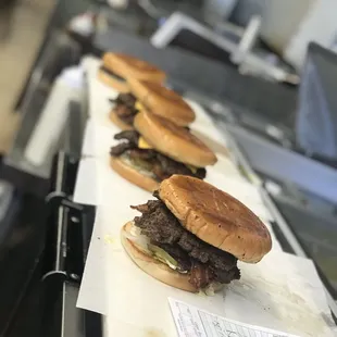 hamburgers on a conveyor belt