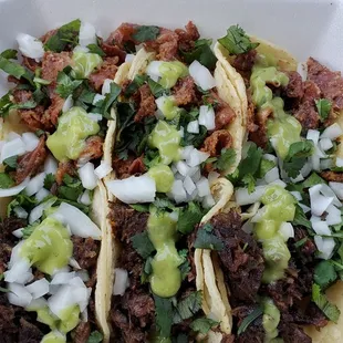 (3) tripas tacos, (3) cabeza tacos, corn tortillas, onions, cilantro &amp; guacamole sauce