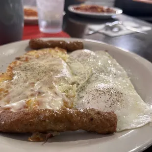 Eggs and sausage with cheesy hashbrowns