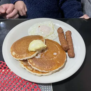 Kids meal: 3 pancakes, sausage and an over easy egg