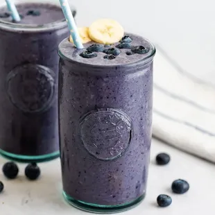 two glasses of blueberry smoothie