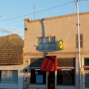 Can't find us? Look for the target above our door.