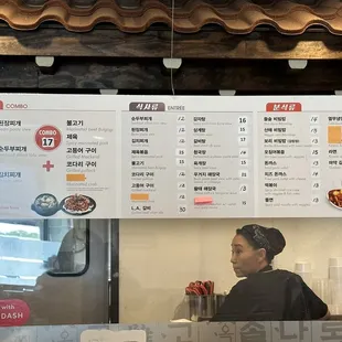 a woman sitting at a table