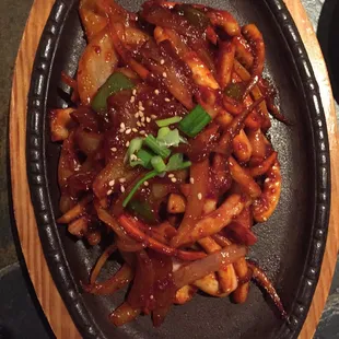 Spivey squid Dinner dish. It comes with daily sides or salad and miso soup. And a bowl of rice. No longer with Japche