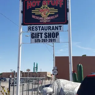 a sign for a hot stuff restaurant