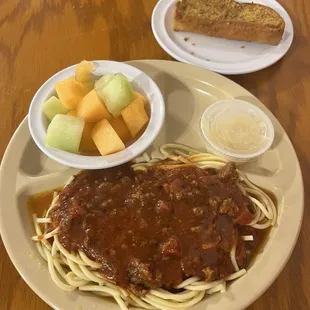Spaghetti and Meat Sauce with a side of Melons