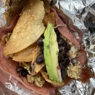 Migas taco with pink corn tortilla