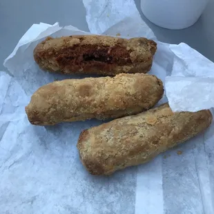 Three fried hot tamales.