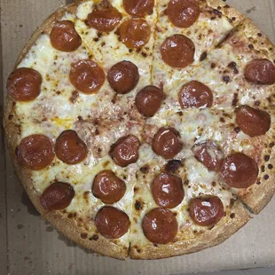 a pepperoni pizza in a box