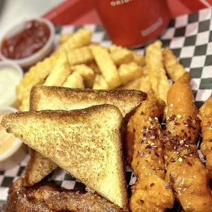 a plate of food with a coke