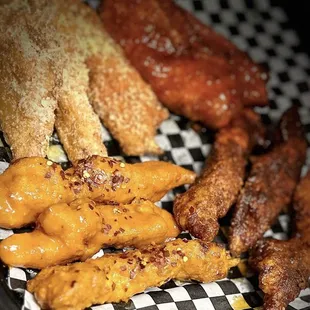 a variety of food on a checkered plate