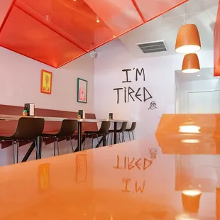 i'm tired written on the wall