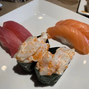 Assorted nigiri tuna, salmon, and scallop delight