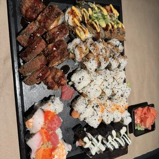 Mumbo Jumbo Sashimi Roll, Crispy Crunchy Roll, Eel Roll, Philadelphia Roll, Tempura Roll, Spicy Tuna Roll and Rainbow Roll.
