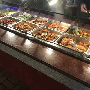 a buffet with many different types of food