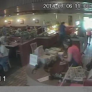 a group of people eating in a restaurant