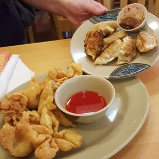 Pot stickers on menu as fried dumplings and crab rangoon