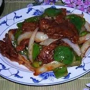 Pepper Steak always served with peppers and onions