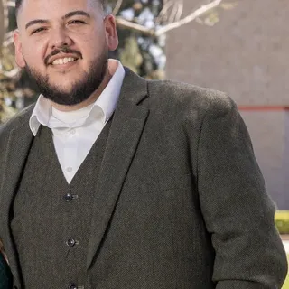 CARLOS A.