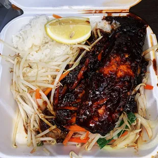 a meal in a styrofoam container